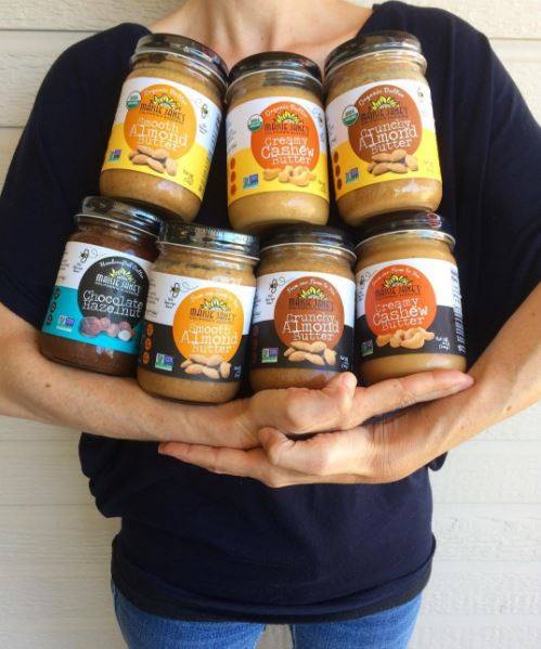 Maisie Jane's Nut Butters being held in someone's arms