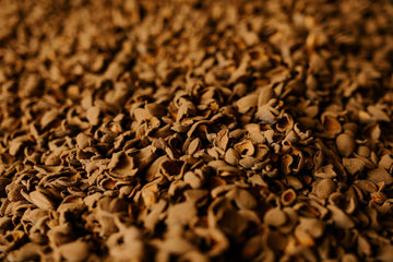 pile of almond hulls