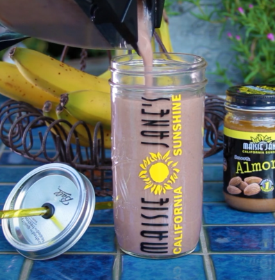 Masie Janes chocolate shake in a branded mason jar glass