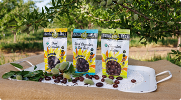 Bags of Chocolate covered nuts on a tray