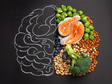 chalkboard sketch of brain with fish, almonds and broccoli