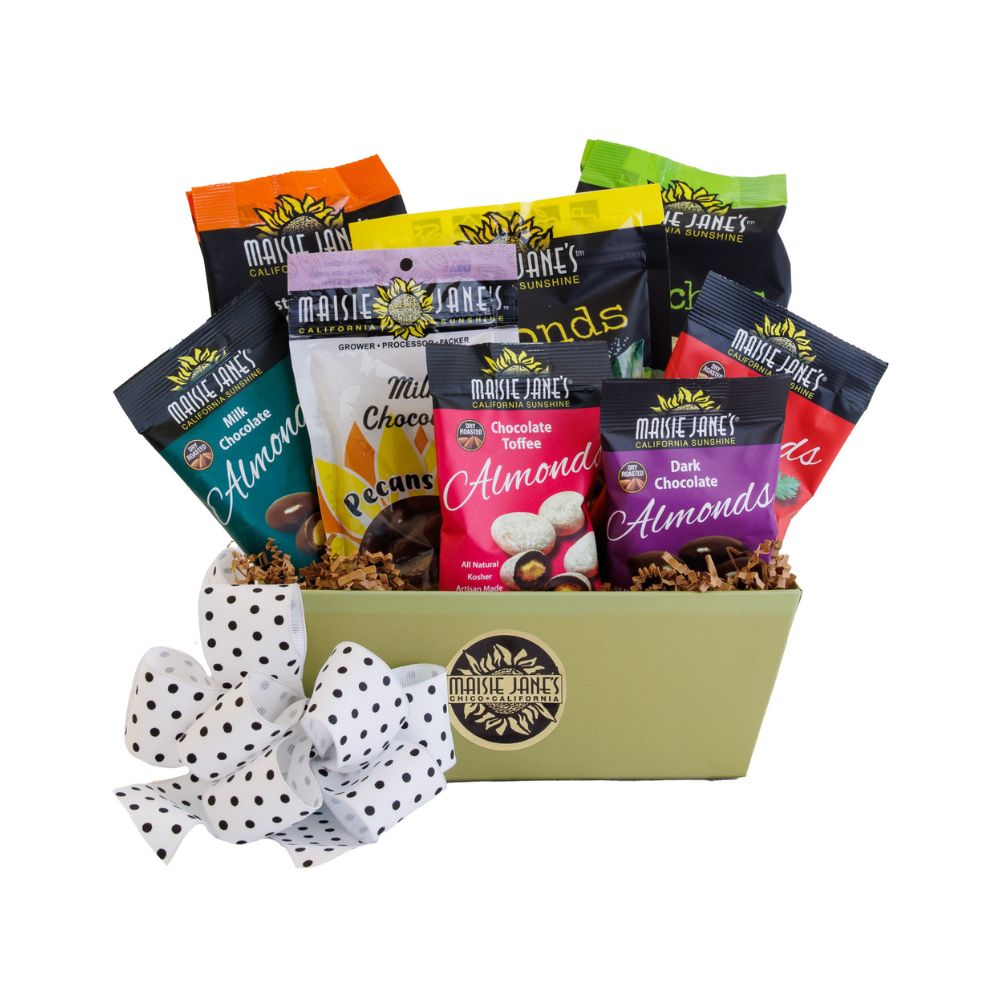 Assorted bags of Maisie Jane's chocolate and snack mix in a box with a decorative bow on a white background.