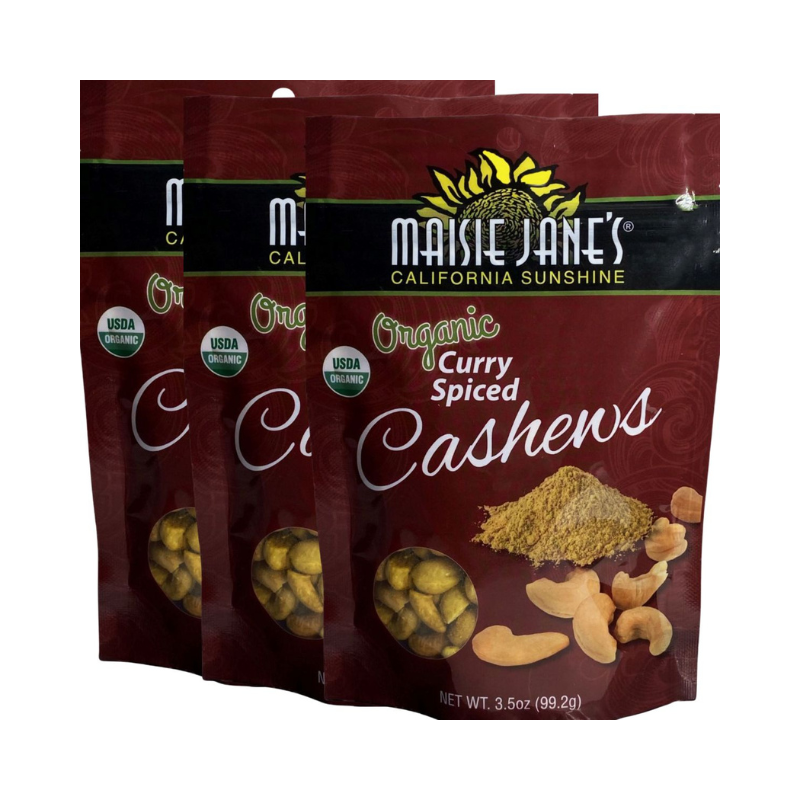Three packages of Maisie Jane's Organic Curry Spiced Cashews on a white background
