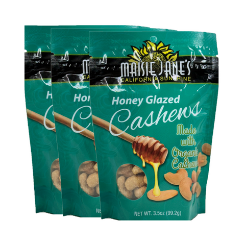 Group of three packages of Maisie Jane's Honey Glazed Cashews made with organic cashews