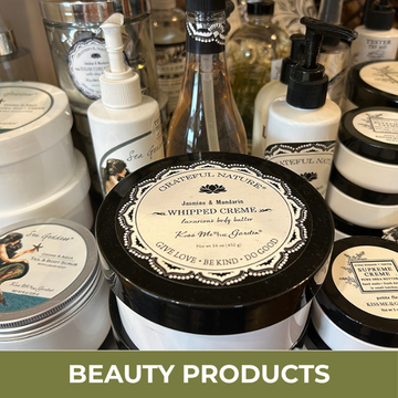Collection of beauty products with visible labels and branding.