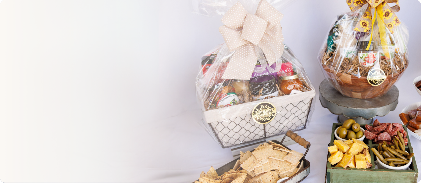 Two gift baskets with snacks on a white background