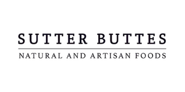 Sutter Buttes logo with text 'Natural and Artisan Foods' on a white background